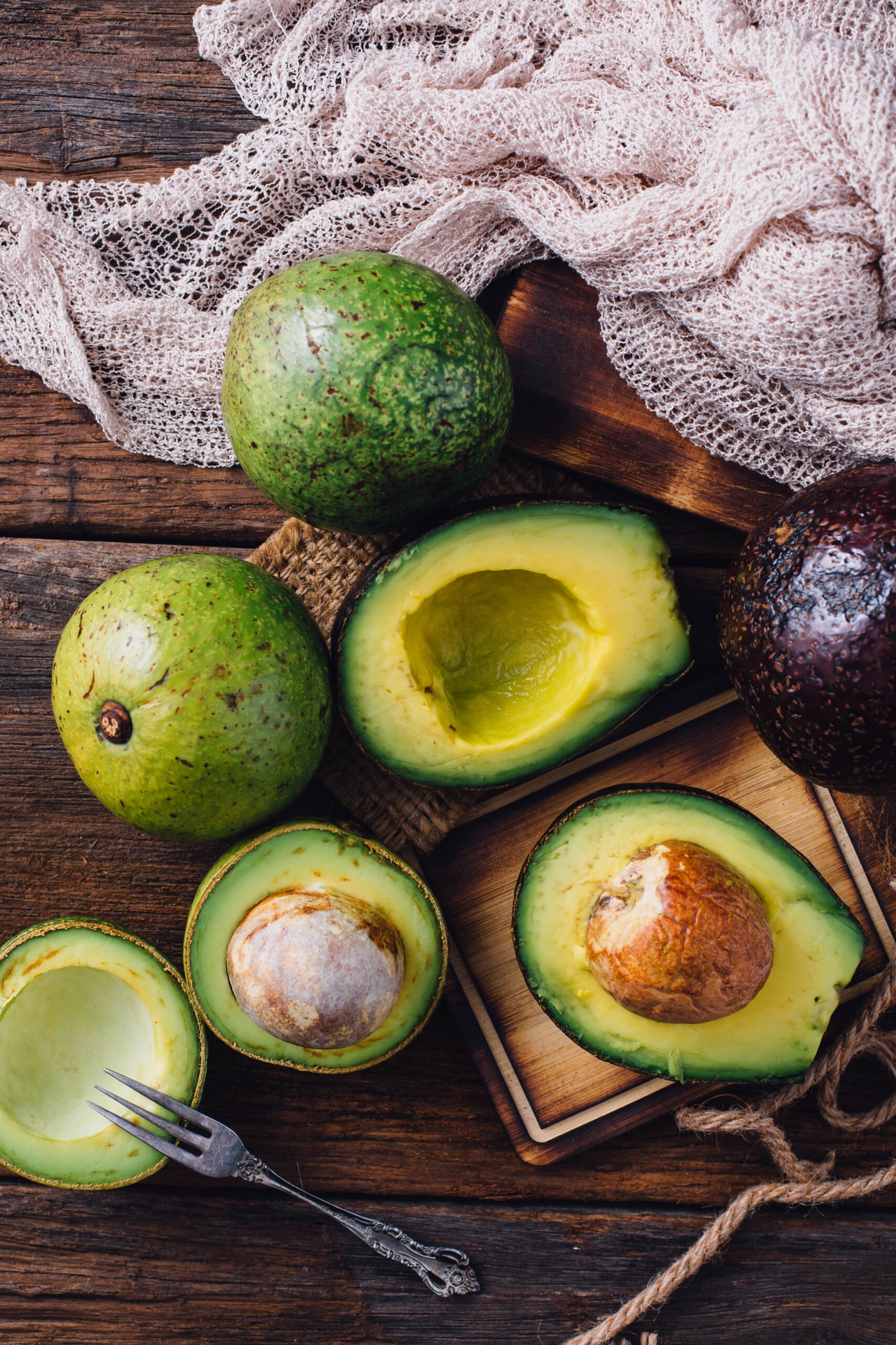 avocado-on-wooden-table-background-2025-10-28-21-57-27-utc
